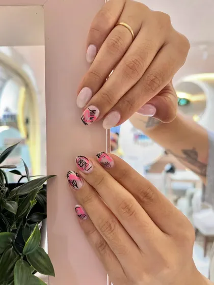Summer vibes at your fingertips! This abstract design in pink and black is edgy, fun, and perfect for the season.