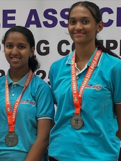 Two of our promising young shooters from the Sub-Youth Women's Air Rifle team with their bronze medals.