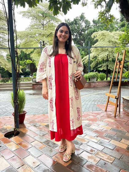 An easy, breezy summer look featuring a printed cape from From Out East. This showcases how to style lightweight layers for a boho-chic vibe, perfect for Indian summers.