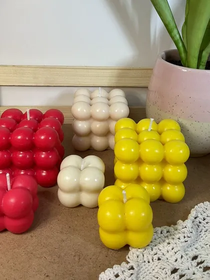 Here’s a glimpse of our vibrant Bubble Candle Collection together. Available in regular and mini sizes and a variety of scents like Blossom Breeze, Vanilla Cloud, and Golden Mango, these soy wax candles add a playful touch to any space.