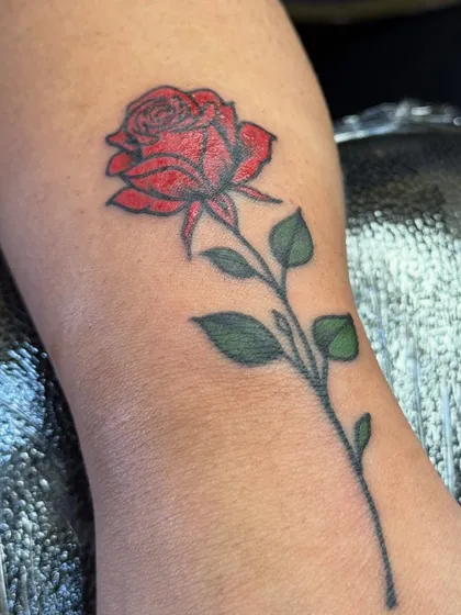 Another close-up of the rose tattoo.