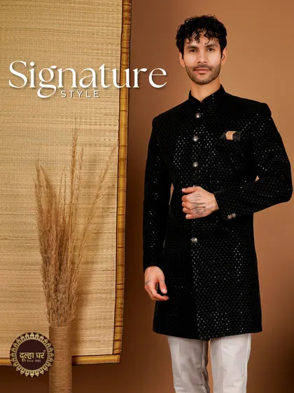 Own your signature style. This black textured sherwani is for the groom who wants a bold, sophisticated, and unforgettable look.