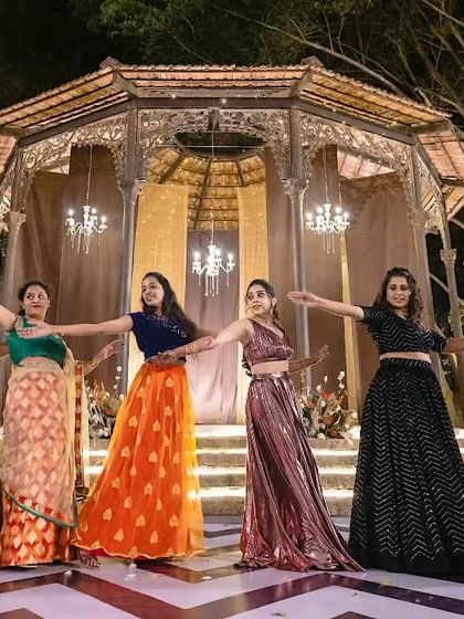 The bride's entire squad posing at the end of their performance. I choreograph routines for groups of all sizes, ensuring everyone looks coordinated and has a great time.