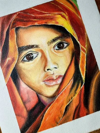 A finished oil portrait of a young girl with expressive eyes, wrapped in a red and orange scarf. I focused on capturing a sense of innocence and wonder in her gaze.