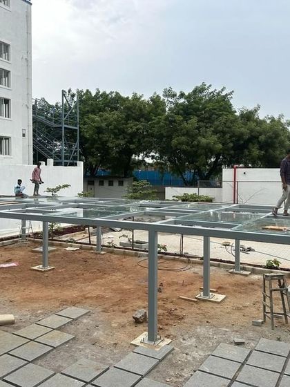 The installation of a glass-roofed pergola at the Good Shepherd Cathedral site in Secunderabad.