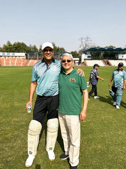 A photo with a colleague on the field. These events build lasting bonds.