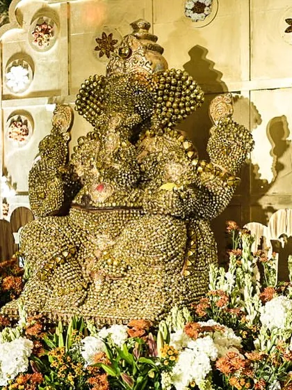 The centerpiece of our entry was this magnificent Ganesha statue, made entirely of ghungroos (small bells) of different sizes. I teach you how to create powerful symbolic elements that set the tone for the entire event.