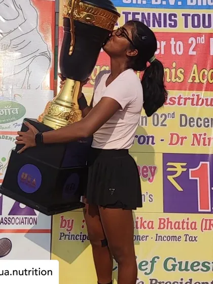 The sweet taste of victory! It's an absolute joy to see my client, Sandeepti Singh Rao, celebrating her win at the AITA Women's Tennis Tournament. For young athletes, a solid nutrition plan is the foundation for future growth, ensuring they have the energy for grueling matches and the nutrients for recovery.