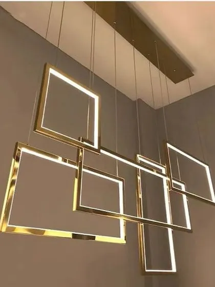A modern LED pendant chandelier composed of five square rings. This fixture can be arranged in various configurations, offering a customizable and highly contemporary lighting solution for stairwells or dining areas.
