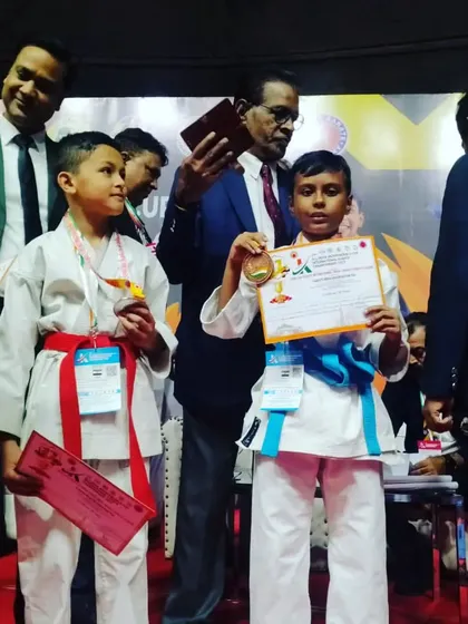 Two of our young athletes celebrating their win. Their journey in competitive karate is just beginning.
