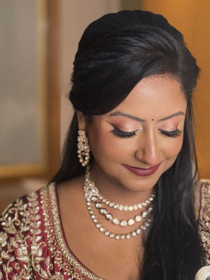 An eyes-closed shot to highlight the beautiful eyeshadow and her serene expression.