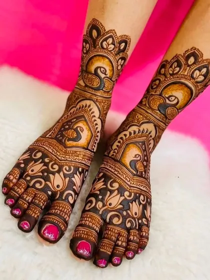 Your feet deserve beautiful mehndi too. Here is an example of my detailed foot mehndi, featuring elegant peacock and floral motifs that are perfect for a bride.