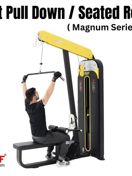 A user performing a lat pulldown on the Magnum Series machine.