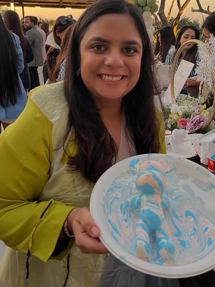 A beautiful pastel blue and pink fluid art bear, created as a special gift at a baby shower. The marbling effect of the paint is simply mesmerizing.