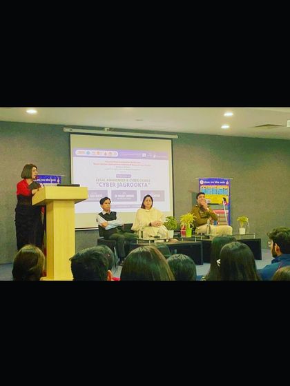 A speaker from the police department addressing the audience. Collaboration with law enforcement is key to these awareness programs.