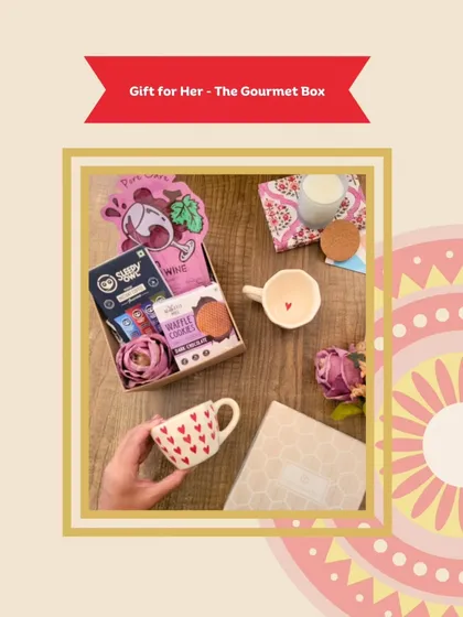 The 'Gift for Her' hamper is a perfect Rakhi surprise for your sister. It includes adorable heart-themed mugs, waffle cookies, and other cute keepsakes and treats she'll love.