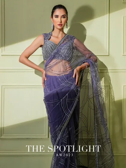 The purple net saree with abstract silver embroidery, featured in "The Spotlight" campaign.