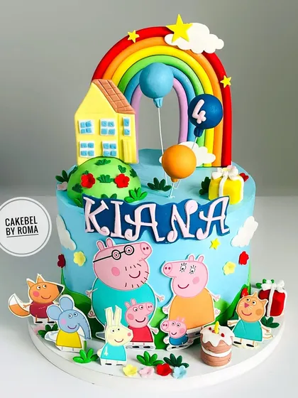 Oink-tastic fun for Kiana's 4th birthday. This Peppa Pig cake is full of sunshine and color, with a bright rainbow and the whole pig family ready to celebrate. It’s a design that guarantees smiles.