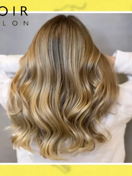 A timeless classic, this blonde balayage is all about creating soft, natural-looking dimension. I meticulously hand-paint each section to achieve a seamless blend that grows out beautifully, giving you that perfect sun-kissed radiance.