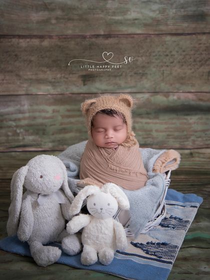 This little bear is snuggled up with his bunny friends. I love mixing and matching my cuddly critter props to create a unique and personalized setup for your baby.
