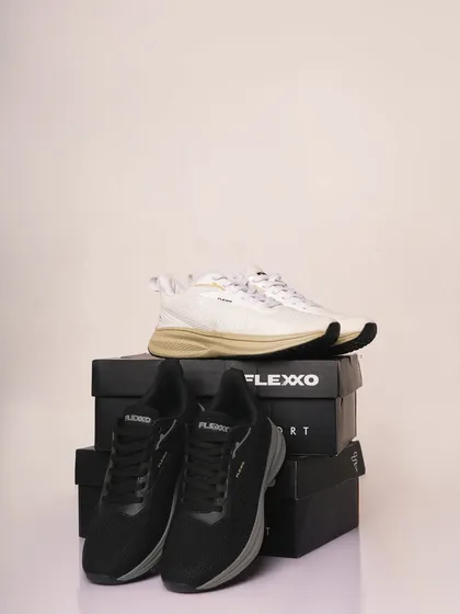 A product shot showing two colorways of the same sneaker style, stacked on their boxes. This is a practical and visually appealing way to display options for an e-commerce website or catalogue.