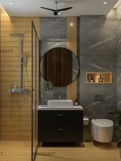 This bathroom design uses a combination of dark grey marble-finish tiles and warm yellow tiles to create a bold, contemporary look, even in a compact space.