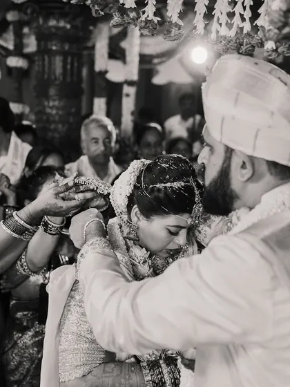 A powerful black and white shot of a sacred wedding ritual. Sometimes, removing color reveals the raw emotion and timelessness of the moment.
