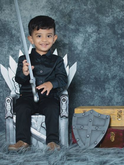 The King in the North! This little warrior is ready to rule the Seven Kingdoms from his own Iron Throne.