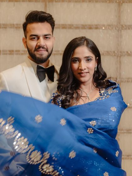 A candid moment from the engagement shoot. Anmol's makeup looks fresh and natural, even in motion.