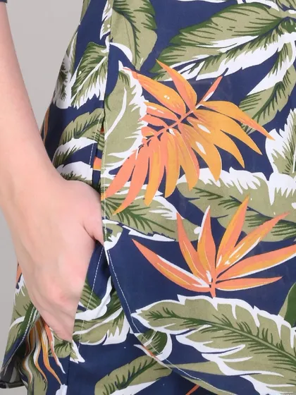 A close-up detail shot of the loungewear set's pocket and fabric print. Macro shots like this build trust by showing the product's quality and construction.