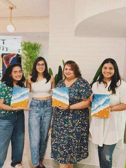 A group of friends enjoying our texture painting workshop. It's the perfect weekend activity.