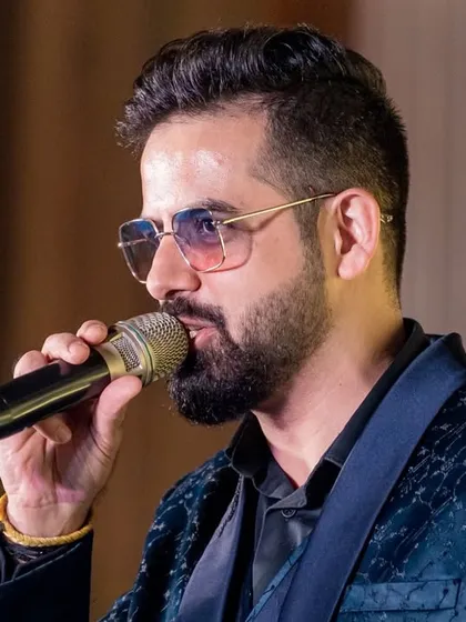 A close-up shot during a Sangeet performance. Whether I am singing or speaking, my focus is always on connecting with the audience.
