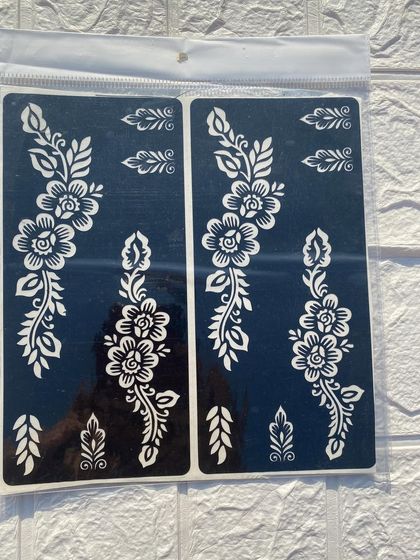 This large stencil sheet offers a variety of floral elements that you can mix and match to create your own unique henna design.