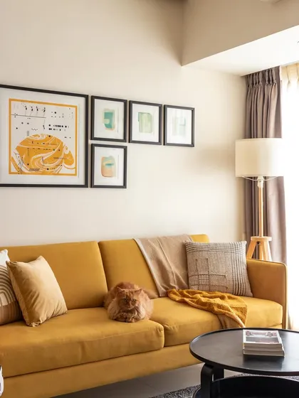 The living room was designed with calmness and tranquility in mind. The carefully crafted furniture, lighting, and art all contribute to the desired serene environment.