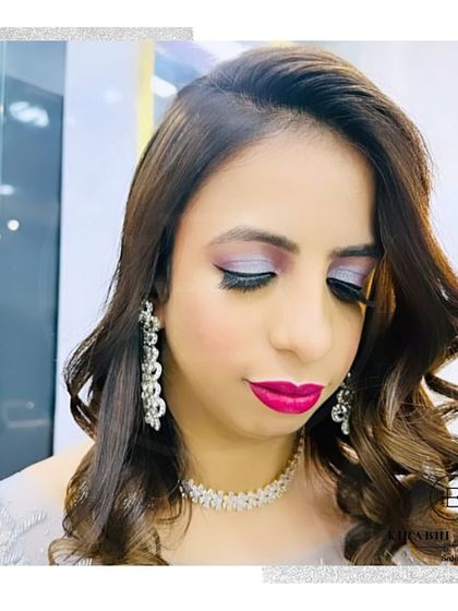 A close-up of a party makeup look. I used a beautiful silver and lilac eyeshadow combination with a bright pink lip for a fun and festive feel.