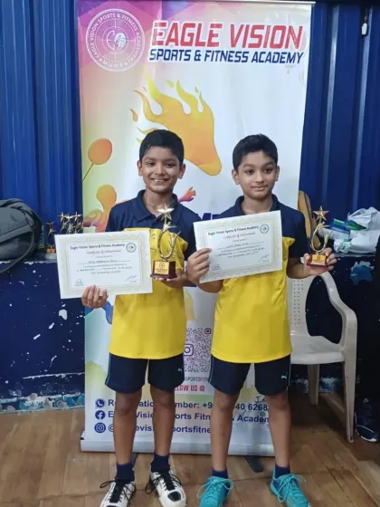 Twin brothers Rhys and Liam Pais with their trophies after competing against each other in the Boys Singles U13 final at the Eagle Vision Badminton Tournament.