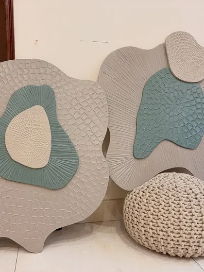 A set of two custom-shaped sculptural pieces made with acrylic on board. The organic forms and layered textures are inspired by natural elements like fungi or coral.