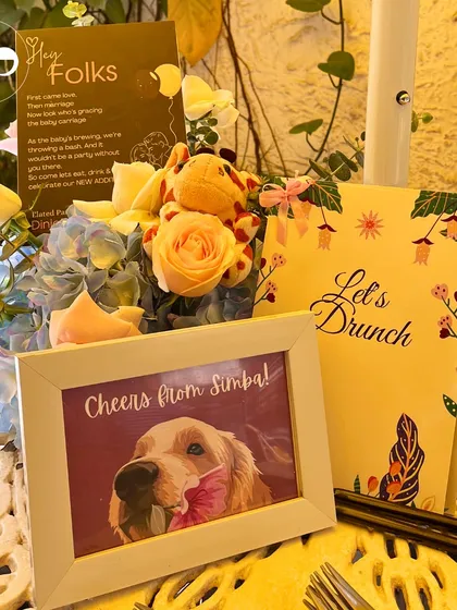 I believe in making every detail personal. This custom table setting includes a framed photo of the family's beloved pet, showing how I incorporate unique, meaningful touches that tell your family's story.