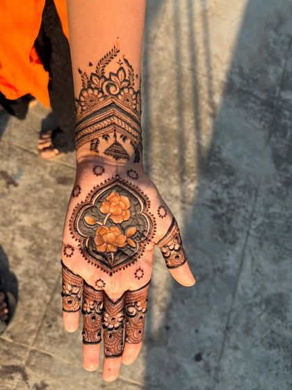 A full view of the shaded floral design, showing the intricate wristband and palm details.