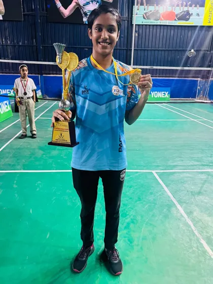 Celebrating another gold medal win at the CBSE tournament. This player's hard work in training paid off on the podium, holding her trophy and medal high.