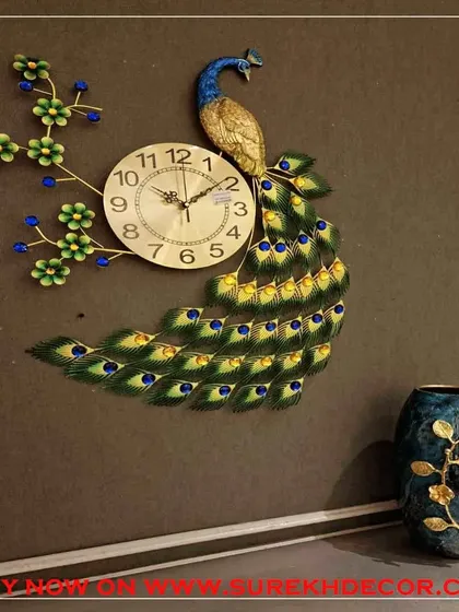 Add a touch of nature-inspired elegance with this peacock wall clock. The design showcases a peacock perched on a flowering branch, combining a functional clock with a beautiful piece of metal art, perfect for adding color and life to your decor.