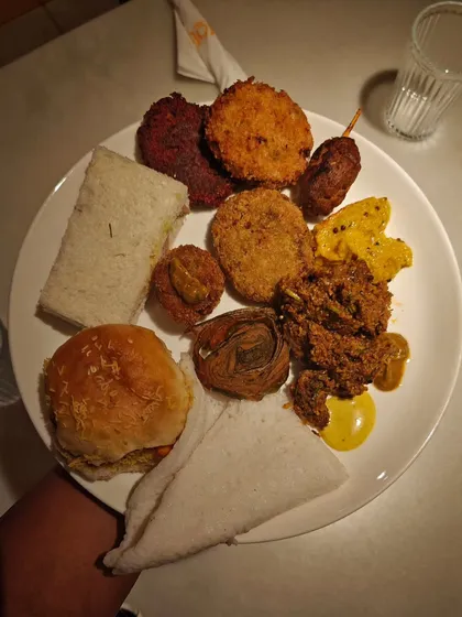 My plate loaded with snacks from the home chef meet-up. It was a delicious opportunity to taste the specialties of 14 other talented chefs from different regions of India.