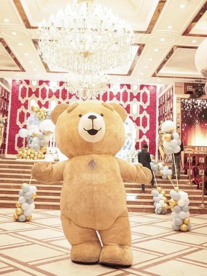 We arranged for a giant teddy bear mascot to delight guests at Yunay's First Lohri celebration.