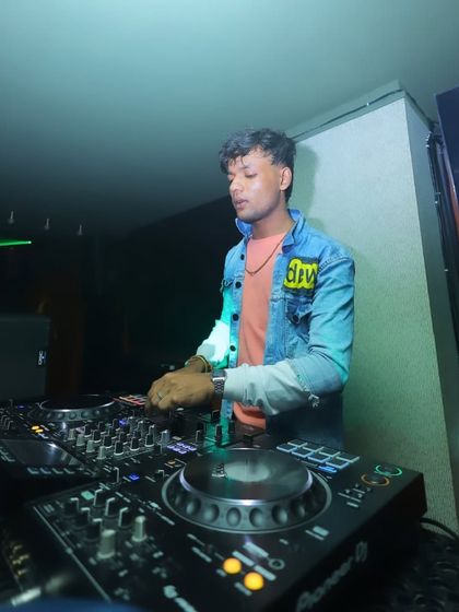 Another angle from a great night, focused on the mix with the party lights creating a cool effect.