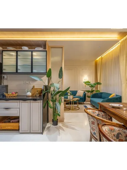 This shot shows the kitchen from the living area, highlighting the open and connected feel of the home's design.