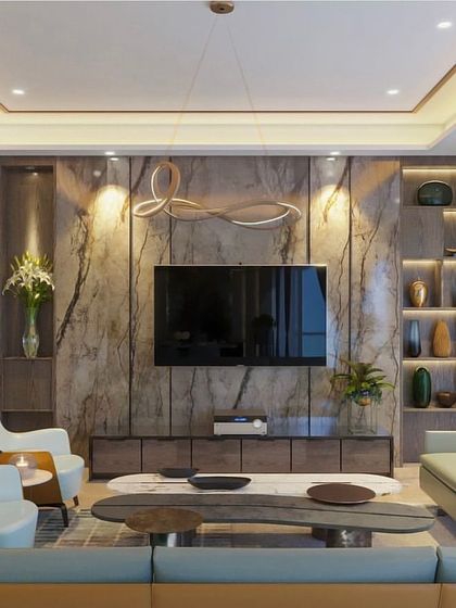 A cozy and layered living room design that marries mint green and brown for a sophisticated look. The marble TV wall is flanked by backlit shelves, providing ample space for displaying decor.