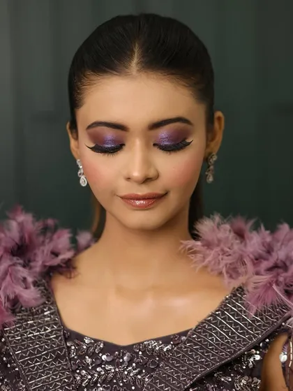 A detailed shot of the purple glitter smokey eye. I love playing with color to create looks that are unique and unforgettable.