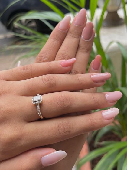 Showcasing the beauty of a multi-tonal manicure using only dip powders. This set features a sophisticated gradient of pink and nude shades, proving that simple can be stunning.