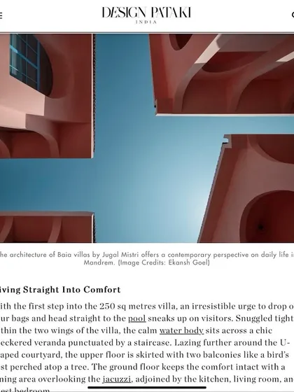 A screenshot from the Design Pataki feature, detailing how the Baia Villas' design invites visitors to dive straight into comfort. The calm water body sits within a U-shaped courtyard, creating an immediate sense of retreat.