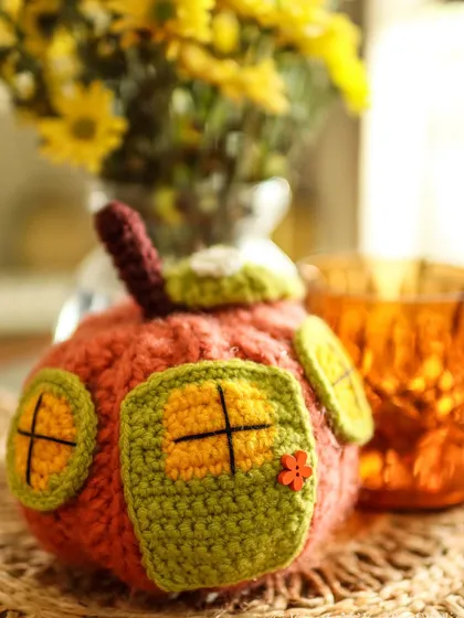 Another look at the adorable Pumpkin House. The tiny button on the door is one of my favorite little details on this piece.